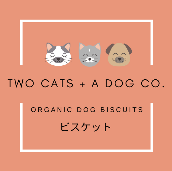 Two Cats + A Dog Co. logo